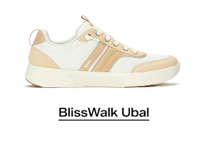 A side view of the BlissWalk Ubal Mesh/Suede/Leather Slip-On in egret/Cuban sand. Shop BlissWalk Ubal