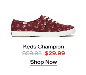 A side view of the Keds Champion Canvas Print Floral Lace-Up in burgundy. The style was $59.95 and is now $29.99 for a limited time. Shop Now