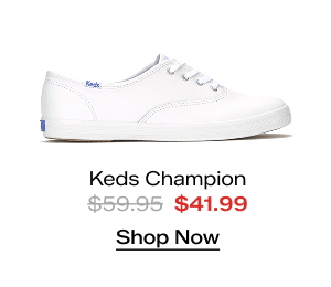 A side view of the Keds Champion Originals Lace-Up in white. The style was $59.95 and is now on sale for $41.99. Shop Now.