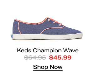 A side view of the Keds Champion Point Low Wave Nautical Chambray Lace-Up in blue/neon coral. The style was $64.95 and is now on sale for $45.99. Shop Now.