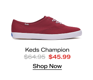 A side view of the Keds Champion Canvas Lace-Up in dark red. The style was $64.95 and is now on sale for $45.99. Shop Now.