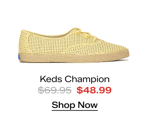 A side view of the Keds Champion Point Low Wave Perf Leather Lace-Up in yellow. The style was $69.95 and is now on sale for $48.99. Shop Now.