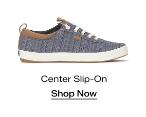 A side view of the Center III Stripe Chambray Slip-On in blue/cognac. Shop Now
