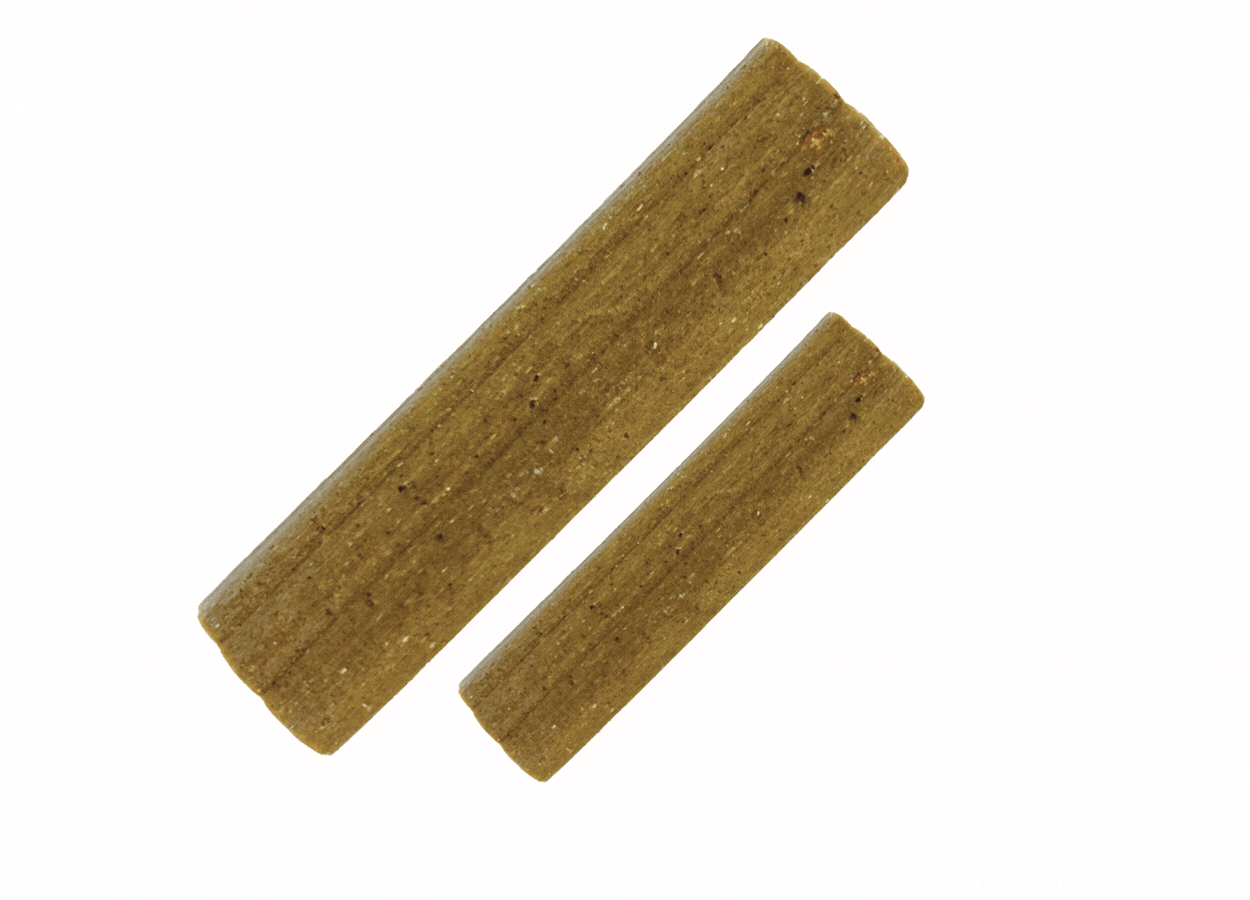 Gif of KONG Ziggies Enhanced with arrows pointing to it that say "plant-based nutrients, naturally delicious, and helps support oral health"