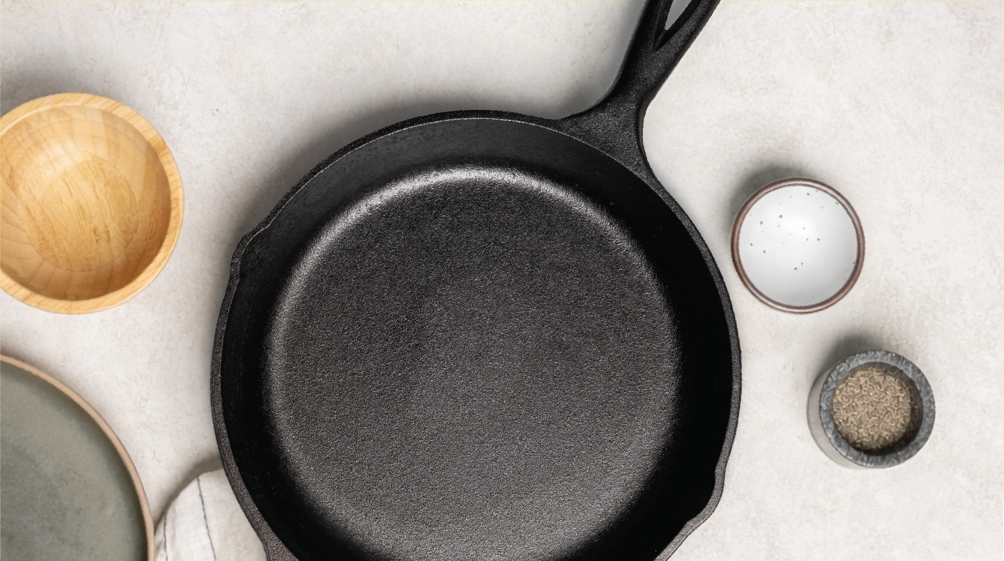 Top down view of a cast iron skillet on a counter top