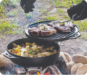 The Cook-It-All being used as a dutch oven over a campfire