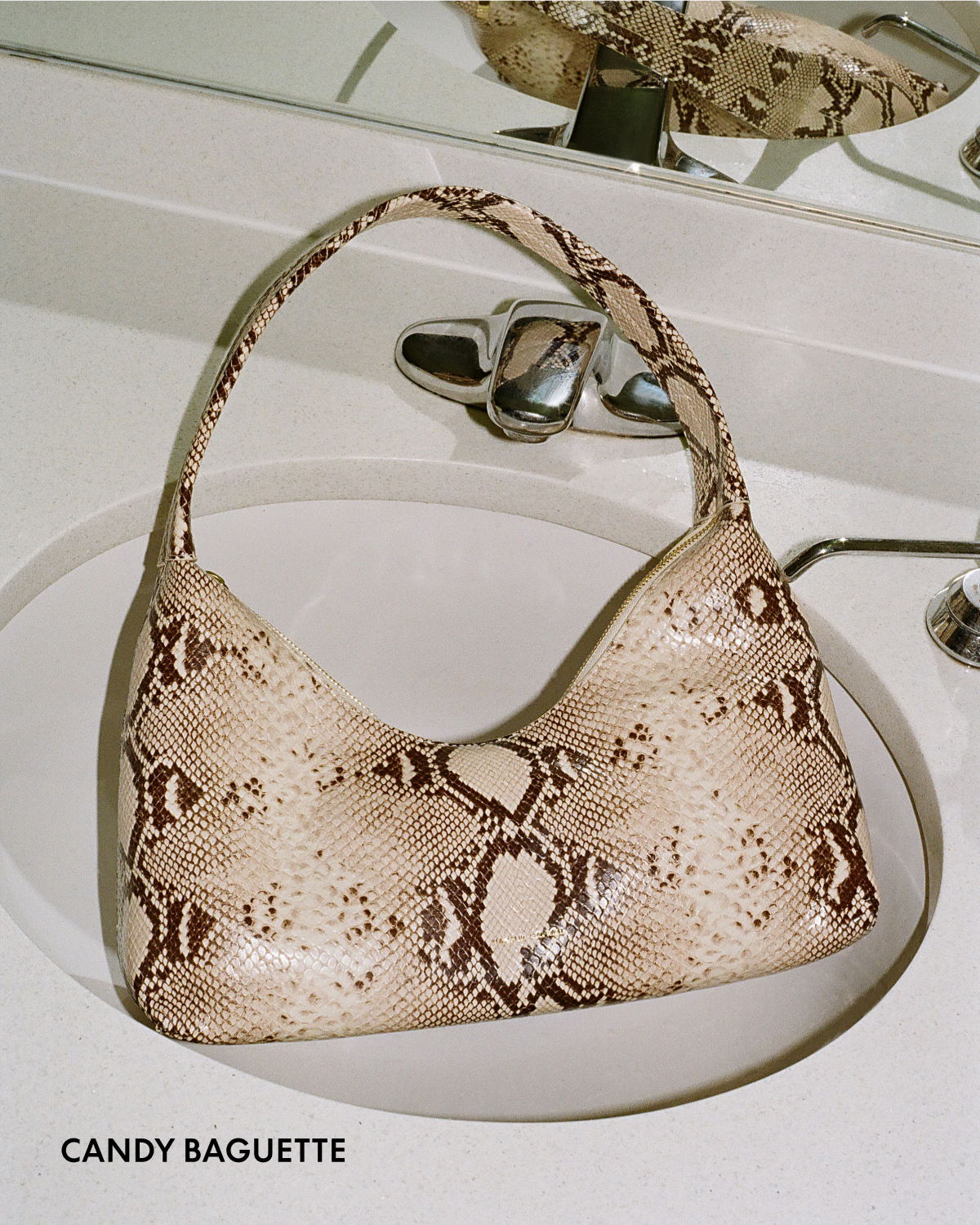 Roccia is our new snake print—a richly detailed, stamped leather with depth and dimension.
