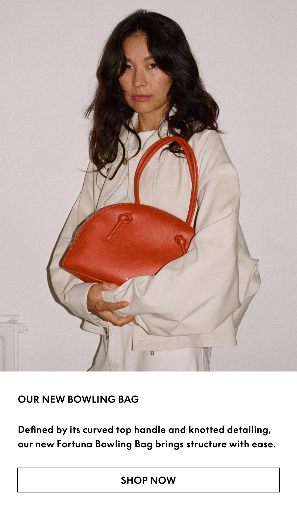 Defined by its curved top handle and knotted detailing, our new Fortuna Bowling Bag brings structure with ease.