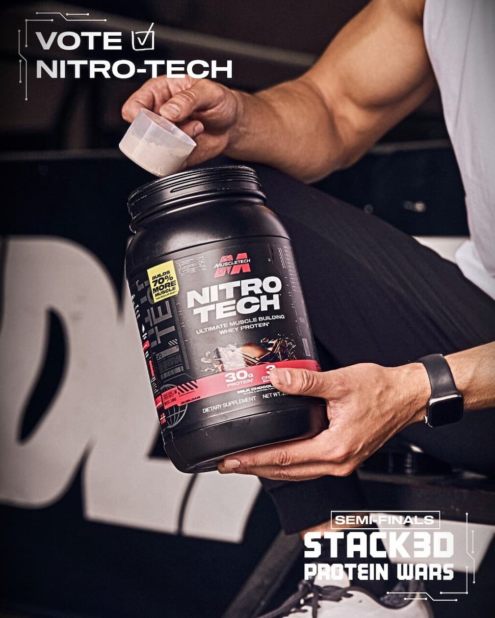 Athlete taking scoop of protein from bottle of Nitro-tech