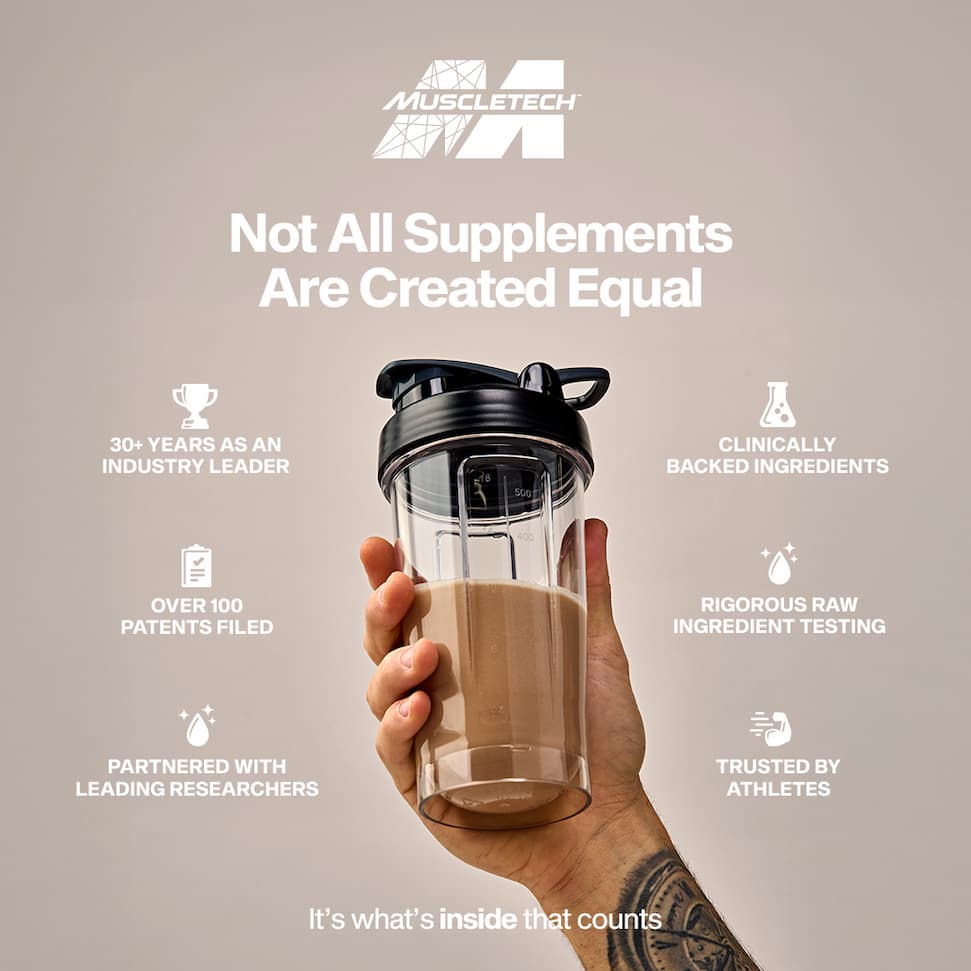 Man holding shaker cup of protein shake