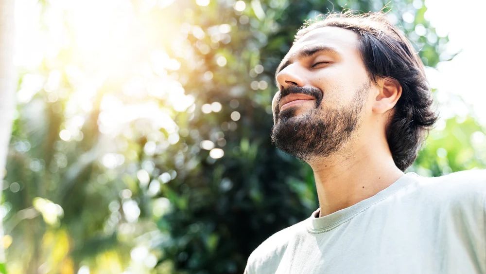 Man Smiling in Sunshine