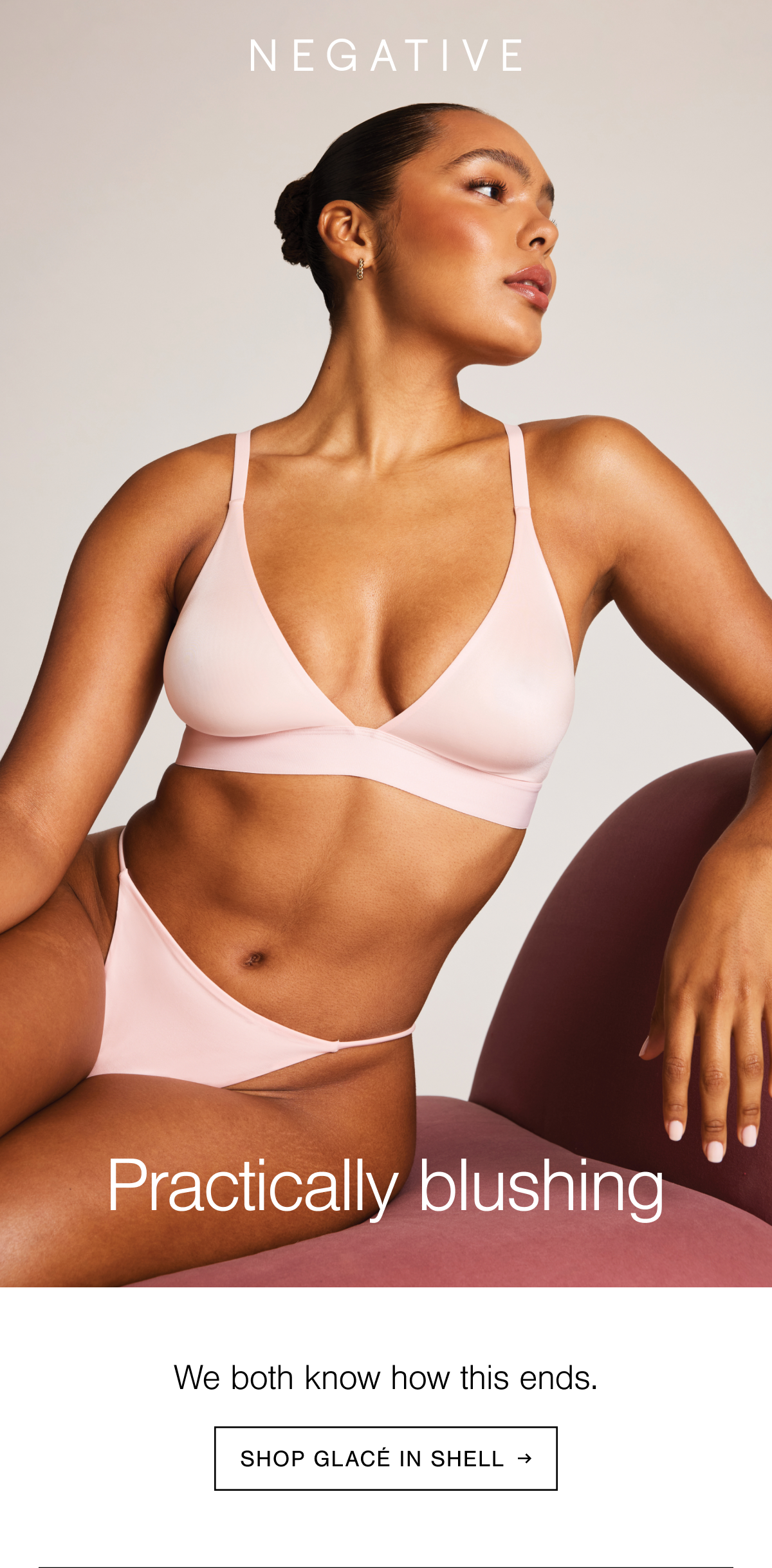 Deep plunge neckline. High gloss sheen. New in Shell: a rose-tinted cherry blossom blush pink tone.