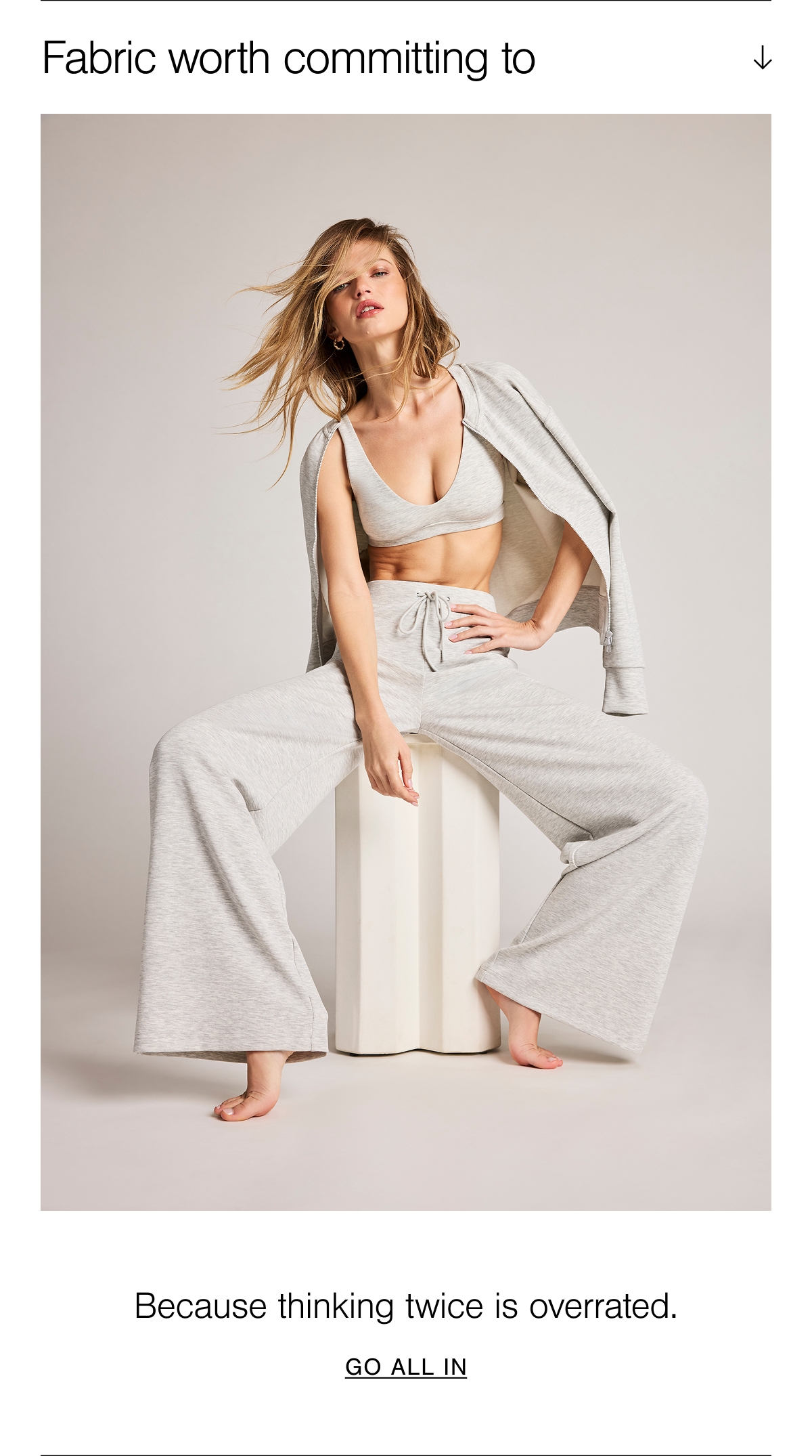 Featuring the Airis Track Pant, Airis Scoop Bra, and Airis Bomber in Heather Grey. Crafted from brushed modal scuba with the perfect balance of drape and structure.