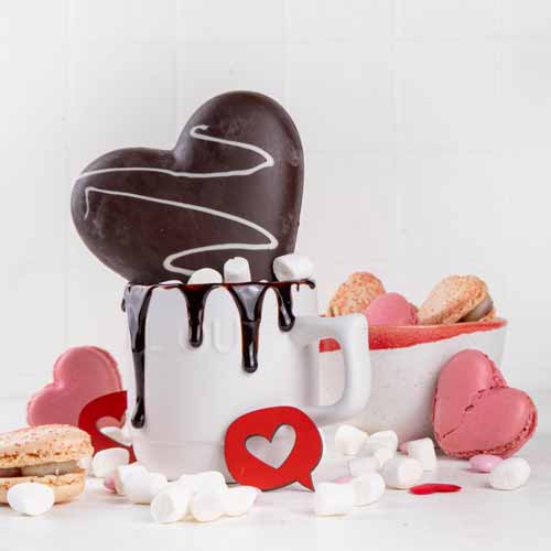 an image of a cup of coffee with a heart on it