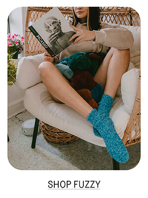 Shop fuzzy socks and slippers