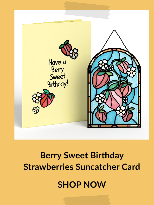 Yellow birthday card with strawberries and the message Have a Berry Sweet Birthday next to a coordinating stained glass-style suncatcher featuring strawberries and flowers. Call-to-action below reads Berry Sweet Birthday Strawberries Suncatcher Card – Shop Now.