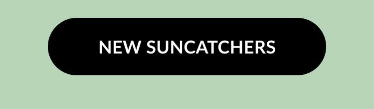 Black button with white text reading New Suncatchers on a mint green background.