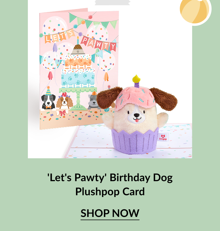 Pastel pink card with cartoon dogs and a party banner reading Let’s Pawty, paired with a plush birthday dog in a cupcake costume. Call-to-action below reads 'Let's Pawty' Birthday Dog Plushpop Card – Shop Now.