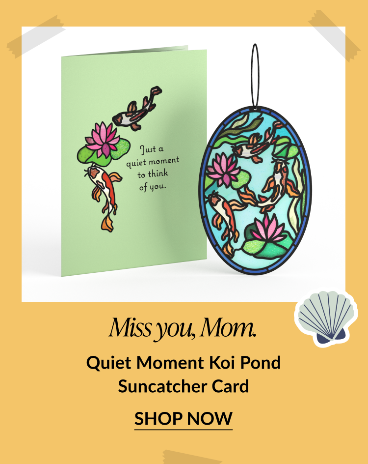 Illustrated card with koi fish and lily pads next to a matching koi pond suncatcher. Card reads: 'Just a quiet moment to think of you.' Text below says: 'Miss you, Mom. Quiet Moment Koi Pond Suncatcher Card.' Button reads 'Shop Now.
