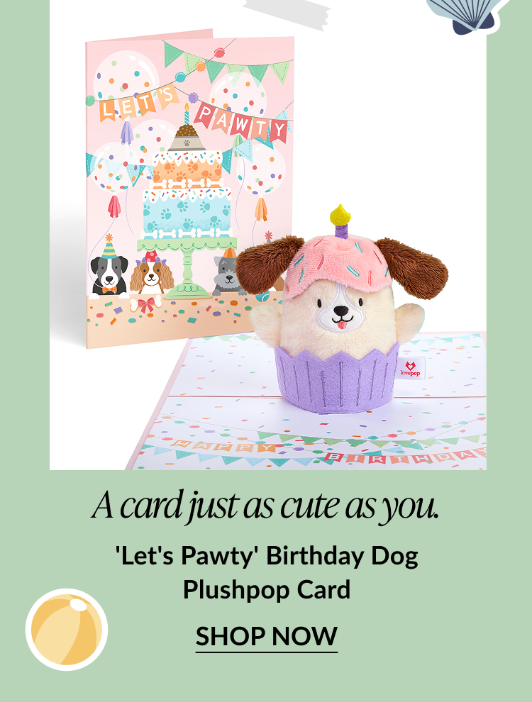 Dog Plushpop in a cupcake wrapper with a pastel party-themed card behind it.