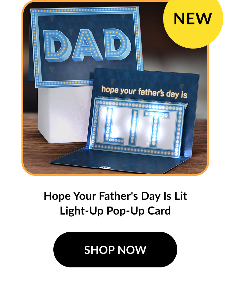 Image of a light-up Father's Day card with a marquee sign design. Outer card reads: ''DAD''. Inner pop-up displays the word ''LIT'' in illuminated letters. Text reads: ''Hope Your Father’s Day Is Lit Light-Up Pop-Up Card''. Button text: ''SHOP NOW''. A yellow badge in the corner reads: ''NEW''.