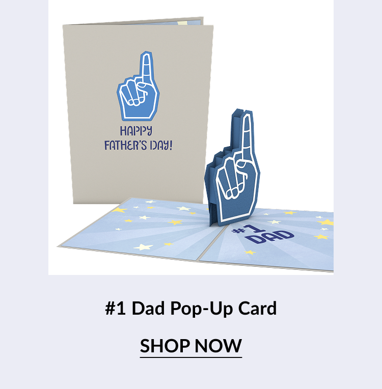 Product image of the ''#1 Dad Pop-Up Card.'' The front cover shows a blue foam finger with the words ''HAPPY FATHER’S DAY!'' Inside, the foam finger pops up above a starry background. Below the card is a ''SHOP NOW'' button.