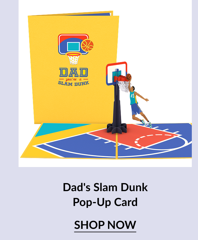 Product image of the ''Dad's Slam Dunk Pop-Up Card.'' The yellow cover shows a basketball hoop and ball graphic with the text ''DAD you're a SLAM DUNK.'' Inside, a 3D basketball hoop with a dunking player pops up over a court illustration.