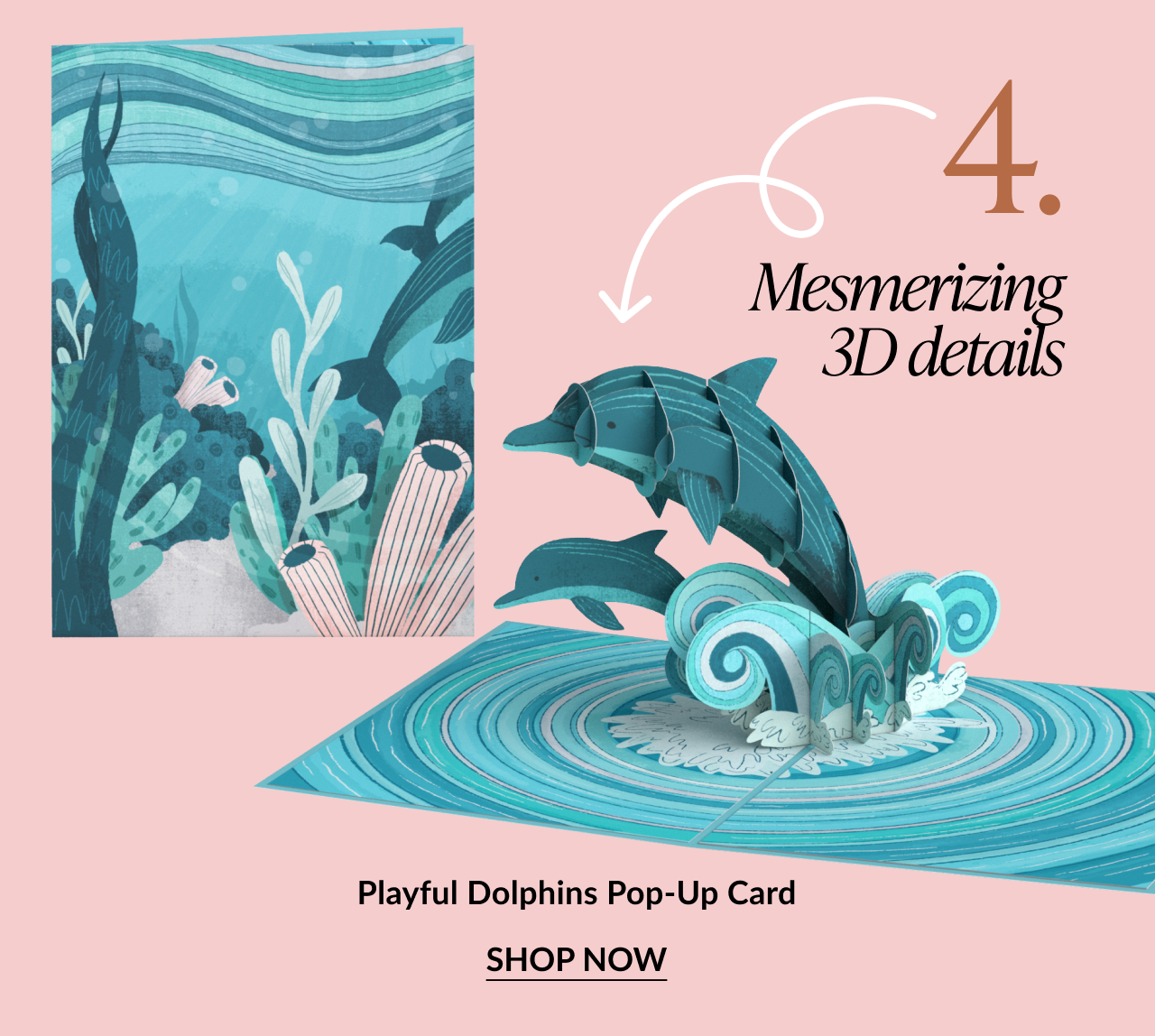 Pop-up card with jumping dolphins splashing through ocean waves. Text reads: Mesmerizing 3D details. Playful Dolphins Pop-Up Card. SHOP NOW.