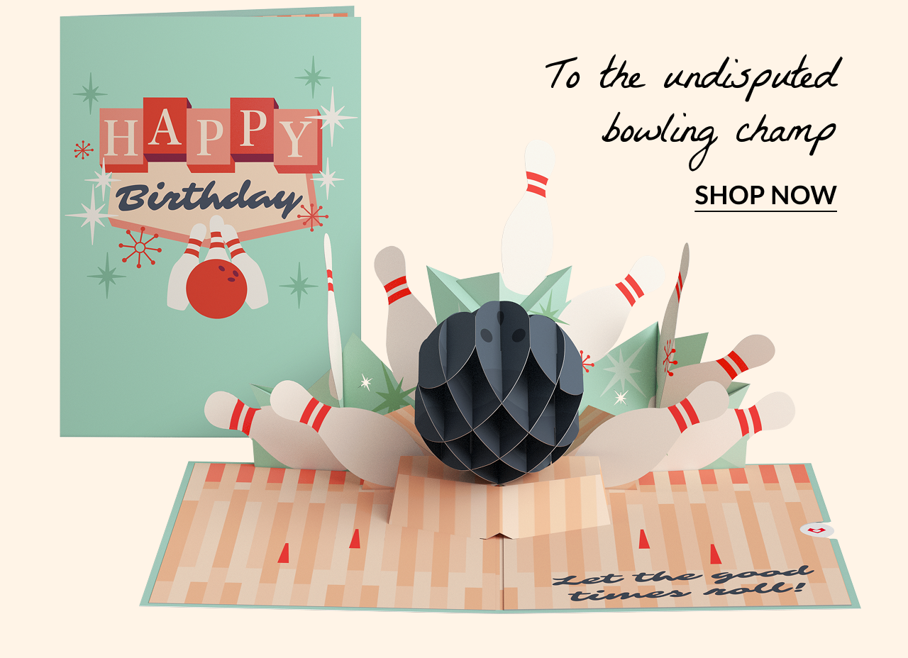 Pop-up bowling card with pins and ball, says “Happy Birthday”