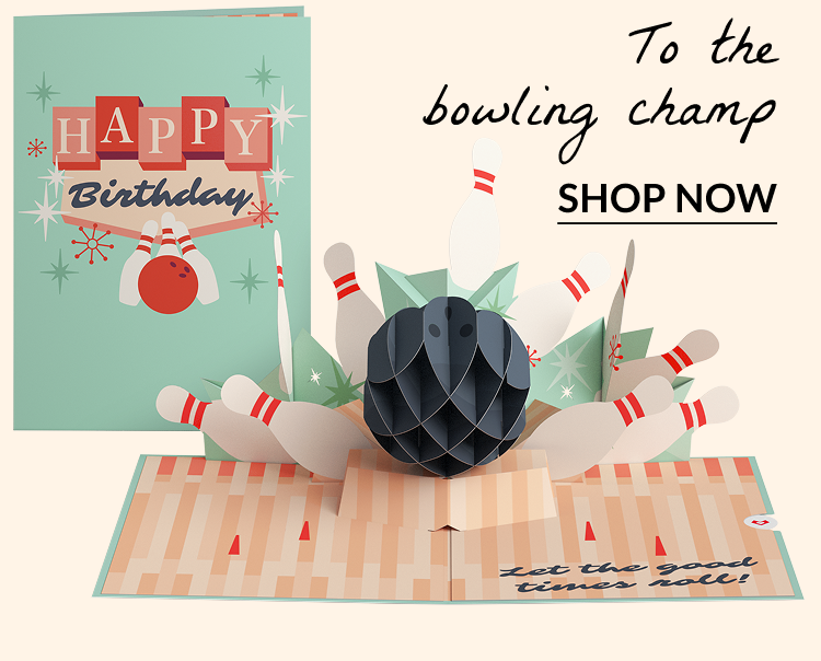 Pop-up bowling card with pins and ball, says “Happy Birthday”