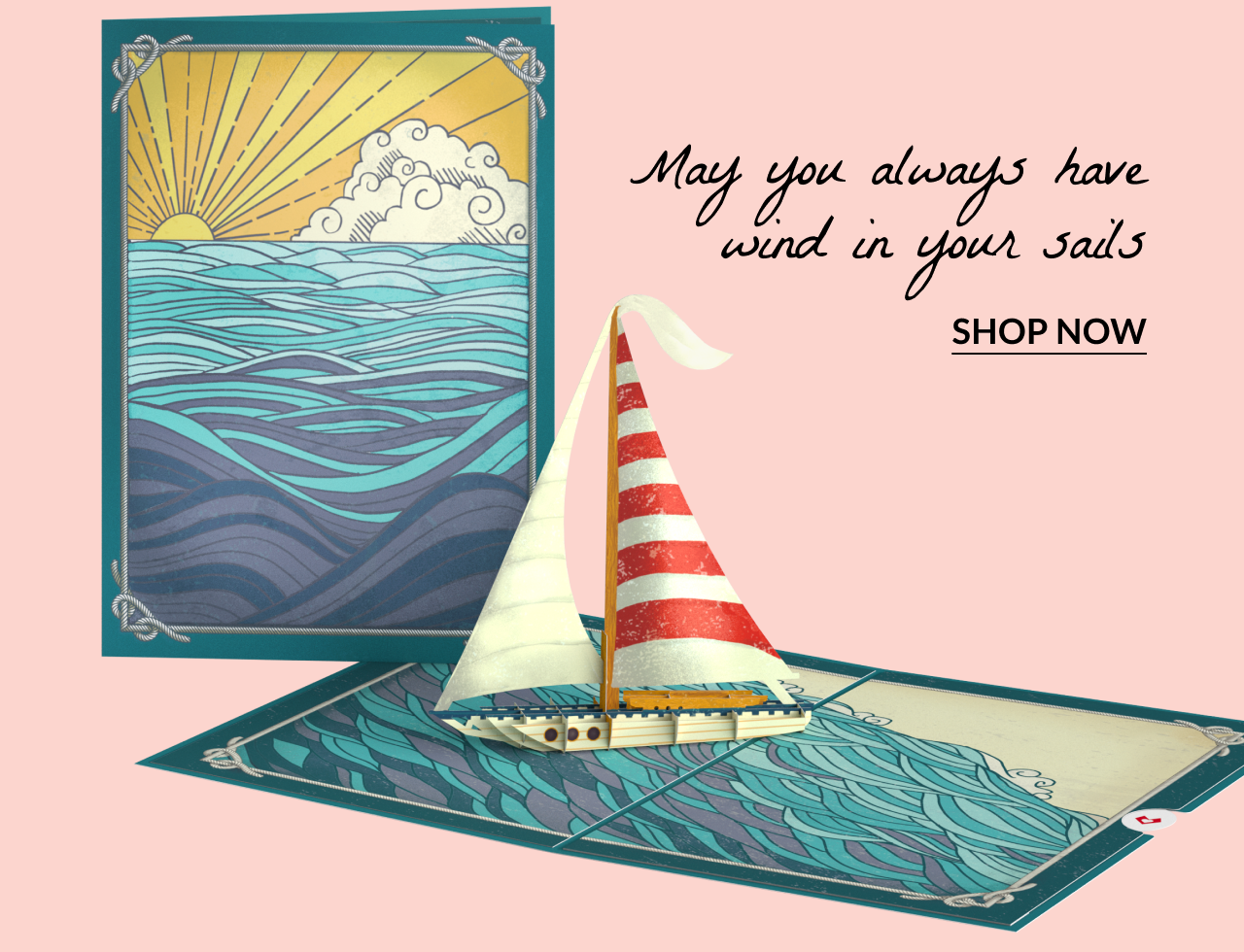 Pop-up sailboat card; text reads “Here’s a little wind in your sails.”