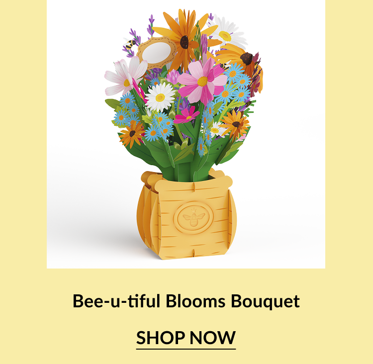 Pop-up bouquet with colorful wildflowers in a honeycomb vase