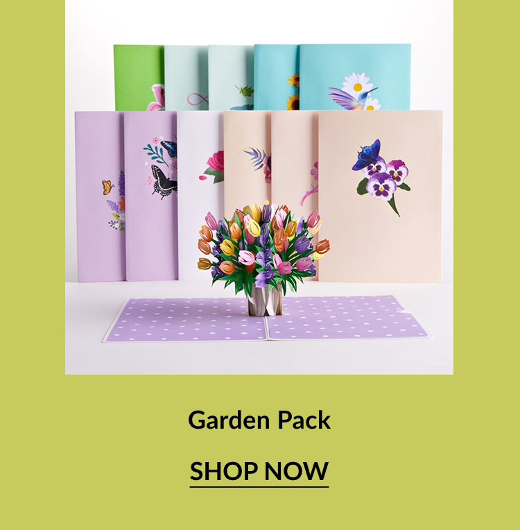 Garden Pack – A collection of pastel-colored greeting cards with floral and butterfly designs, displayed behind a pop-up bouquet of tulips.