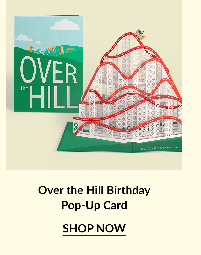 Pop-up card with a retro rainbow design and the text “HOORAY” on the front. The inside reads: “YOU’RE GAY!” Button text: “SHOP NOW”.