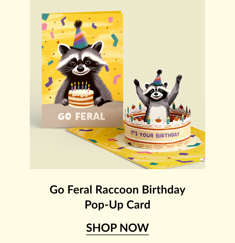 Go Feral Raccoon Birthday pop-up card with a raccoon popping out of a birthday cake.