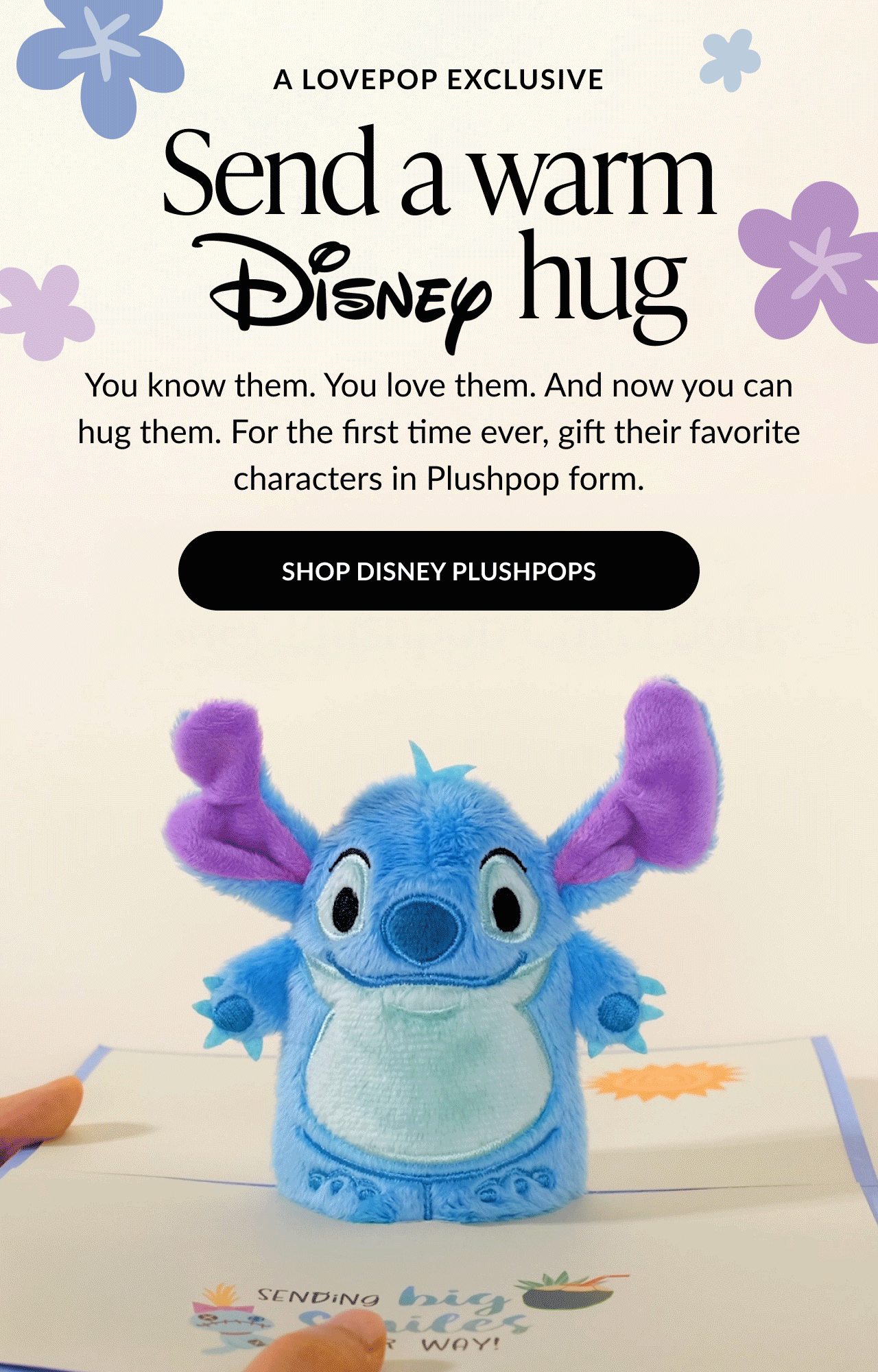 Lovepop Disney Plushpops promotion with text ''Send a warm Disney hug'' and a photo of a blue Stitch Plushpop holding its arms out.