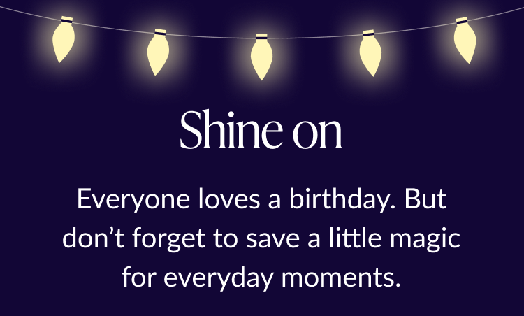 Dark background with glowing string lights and text 