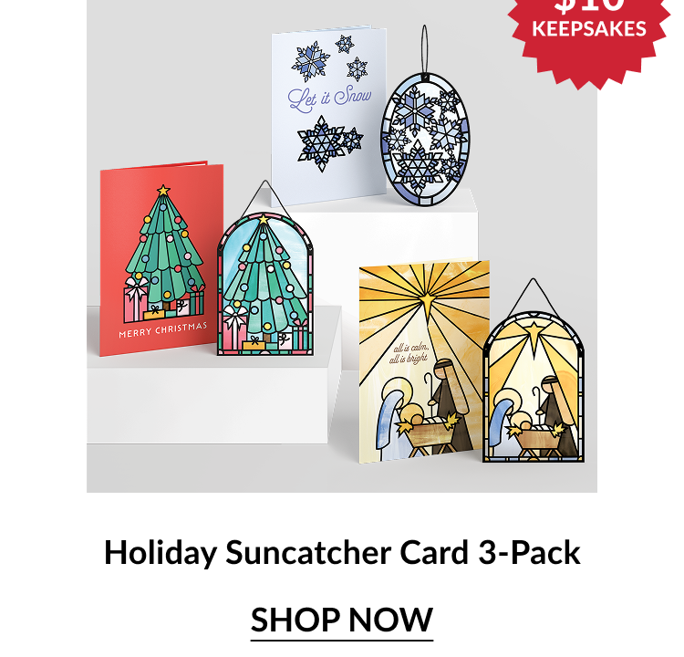 Three holiday-themed cards with matching suncatcher ornaments, including Christmas tree, snowflake, and nativity designs.