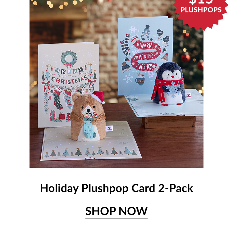 Two pop-up holiday cards featuring a plush bear and a plush penguin, with festive backgrounds.