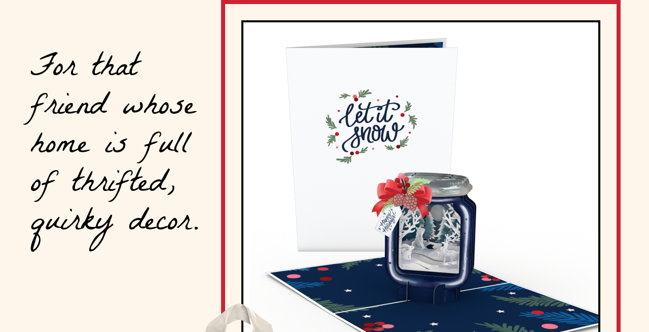 Holiday pop-up card featuring a snow globe jar with a 