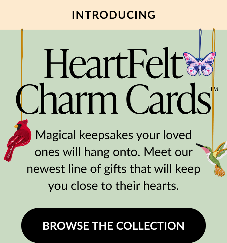 Banner introducing HeartFelt Charm Cards with illustrations of a cardinal, butterfly, and hummingbird charms hanging on strings.