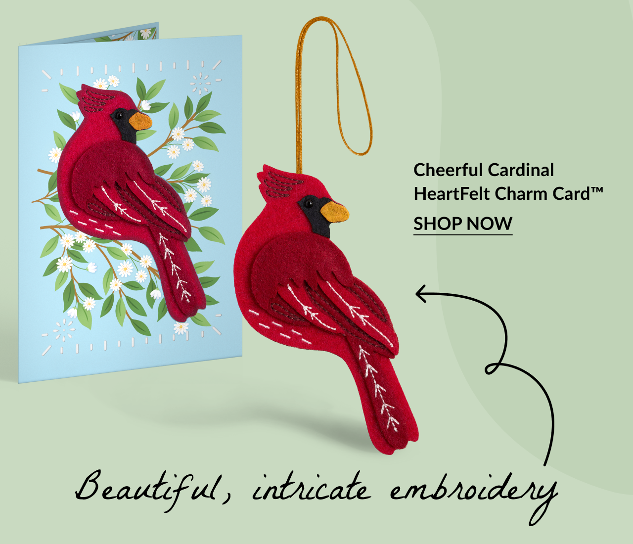 Cheerful Cardinal HeartFelt Charm Card showing a red cardinal charm and a matching card, highlighting the beautiful embroidery.