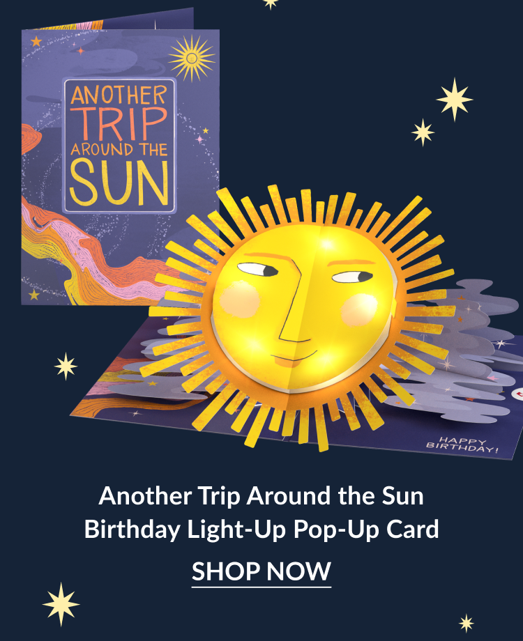 Pop-up birthday card featuring a smiling sun and the phrase “Another Trip Around the Sun.”