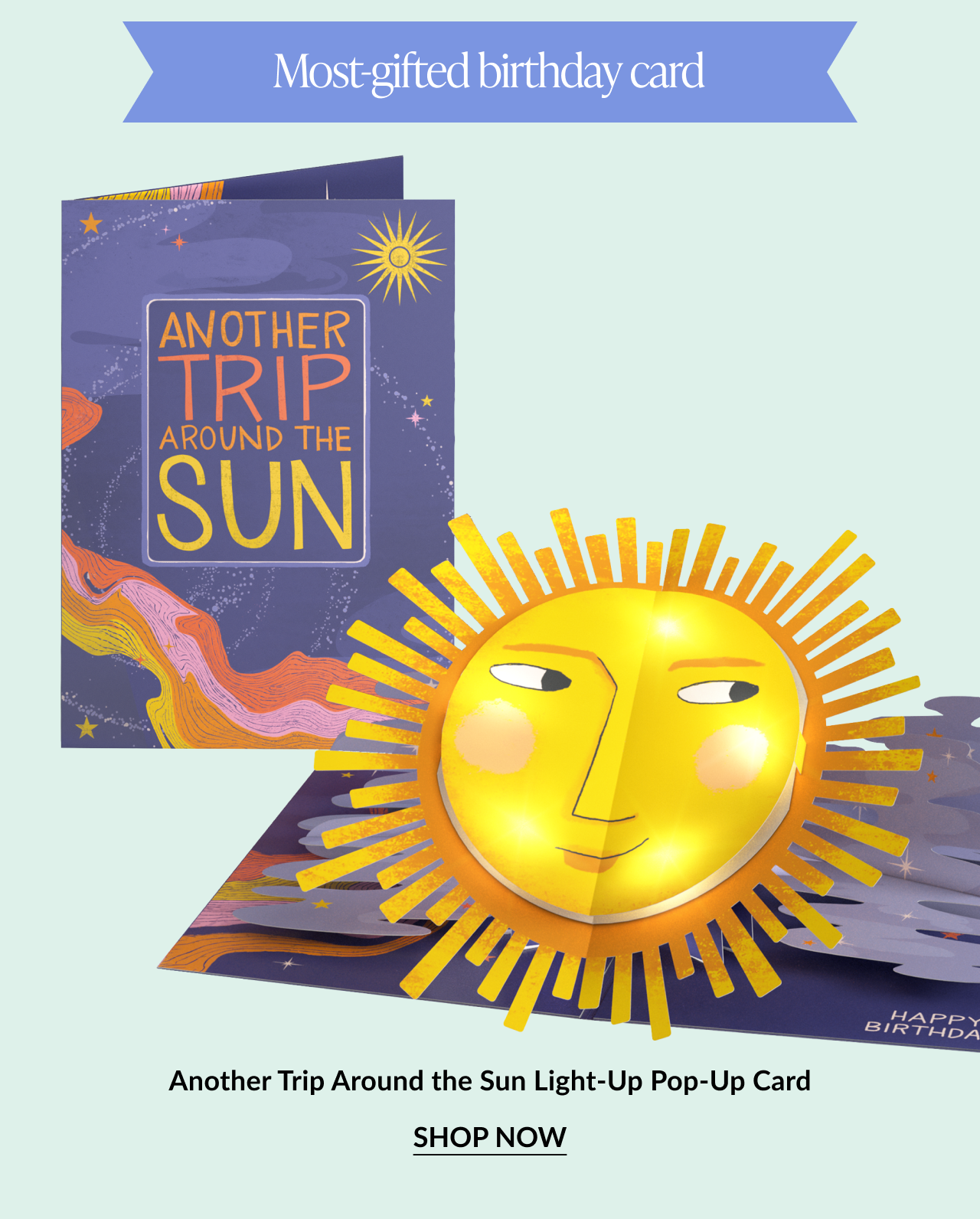Light-up birthday pop-up card with a stylized sun and galactic background. Button: “Shop Now”