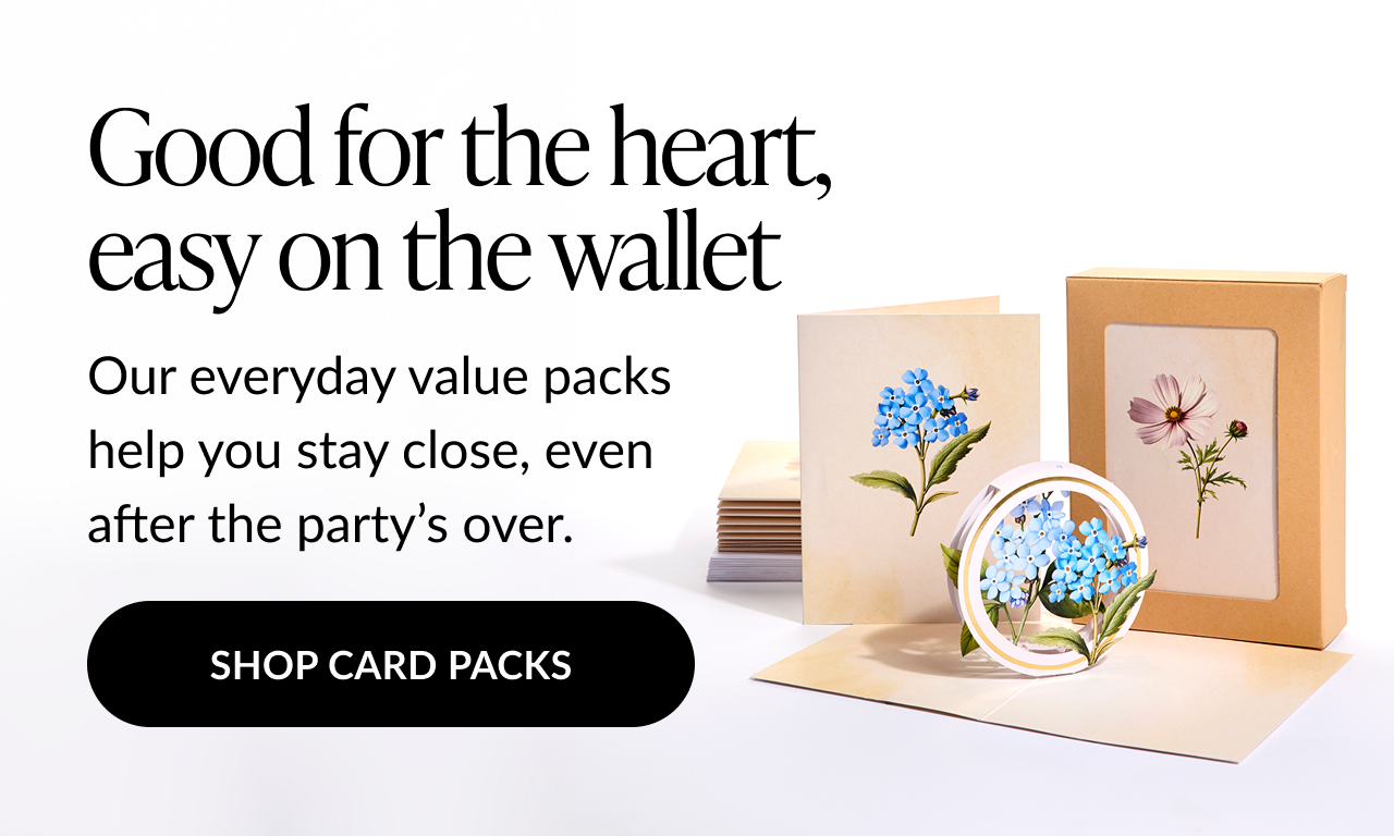 Pop-up card set featuring delicate blue flowers, matching flat cards, and a kraft gift box with floral artwork.
