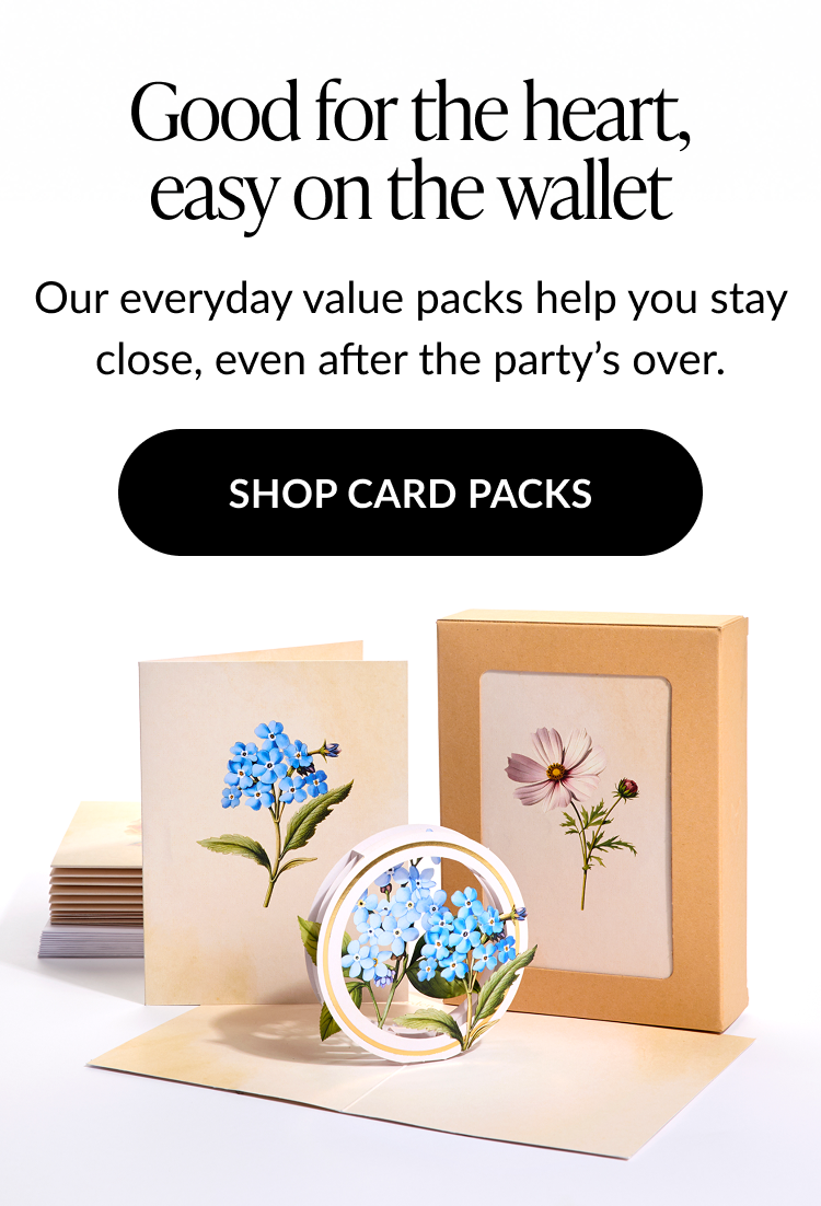 Pop-up card set featuring delicate blue flowers, matching flat cards, and a kraft gift box with floral artwork.