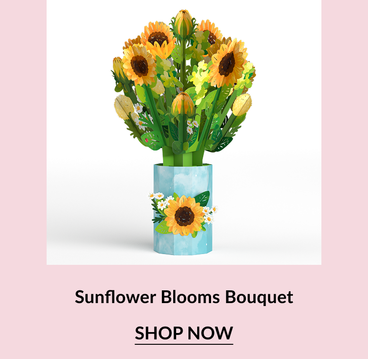 Pop-up bouquet of sunflowers in a blue floral vase