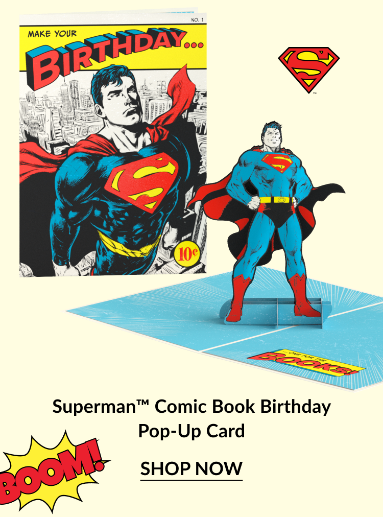 Superman Comic Book Birthday Pop-Up Card featuring a retro comic book cover design and a 3D pop-up Superman figure, with “Boom!” text graphic and “Shop Now” button.