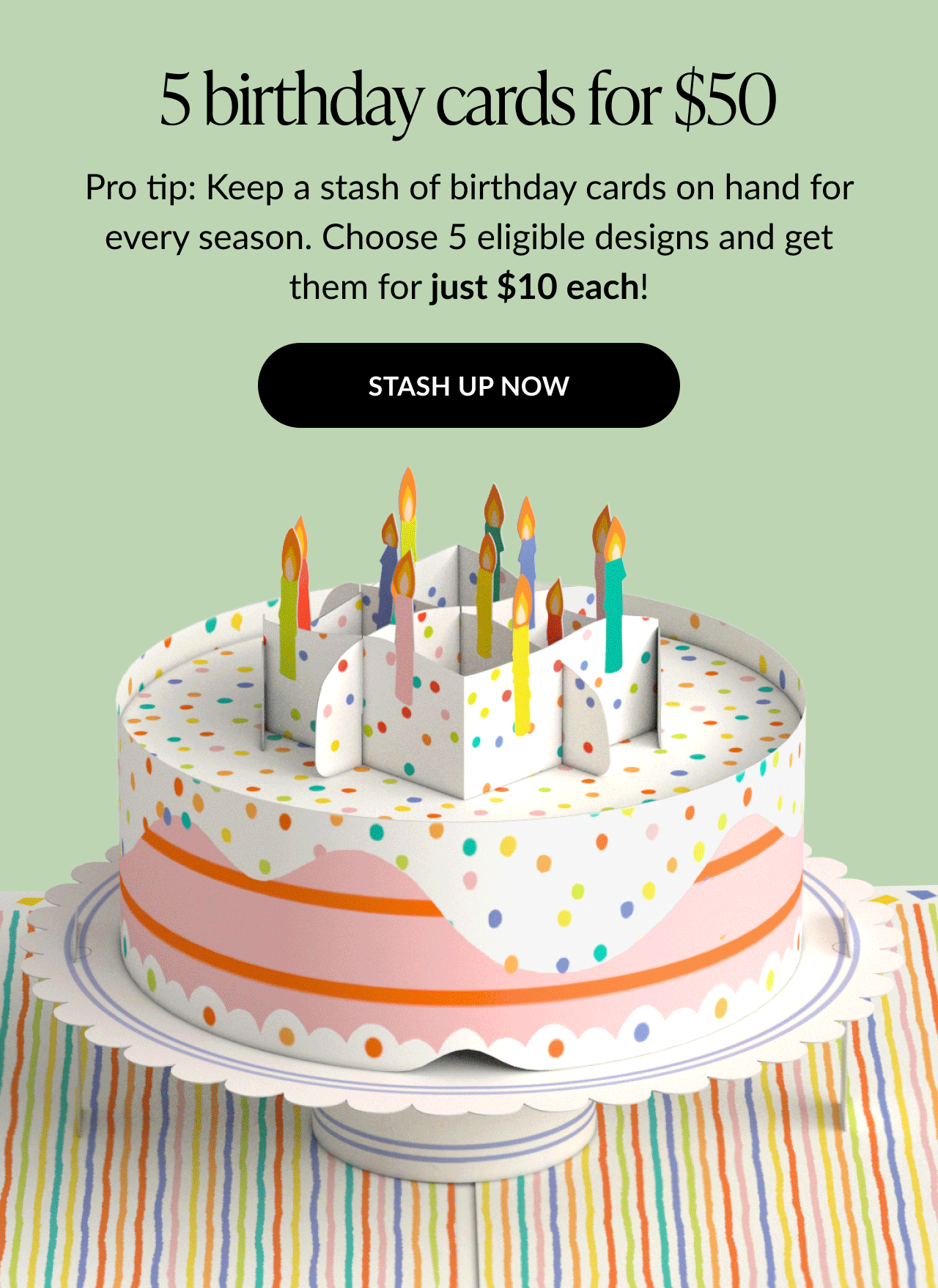 Animated graphic promoting “5 birthday cards for $50” showing a pop-up birthday cake with colorful candles and text encouraging shoppers to stock up, with a “Stash Up Now” button.