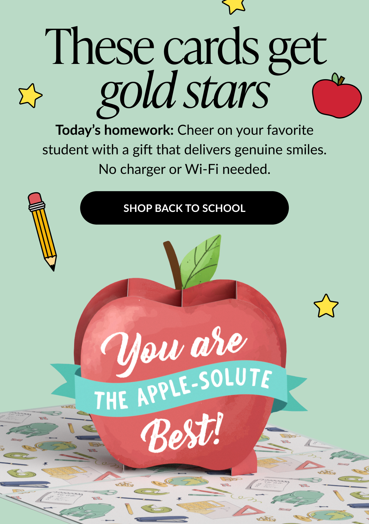 Pop-up apple card reading “You are the apple-solute best!” with school-themed background.